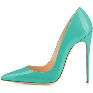 A pair of turquoise pumps. Size 7. 5 with a 5 inch heel